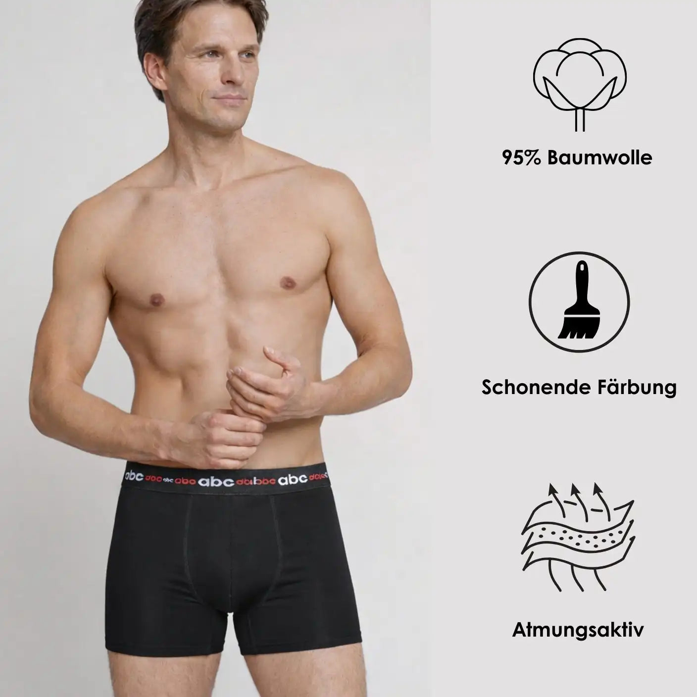 Mann trägt schwarze Herren-Boxershorts – 95% Baumwolle, schonende Färbung und atmungsaktiv (Cotton Majesty)